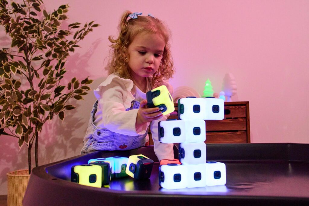 Young girl with Glow cubes