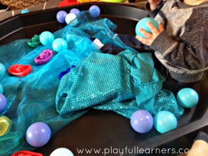 material sensory play in a tuff spot