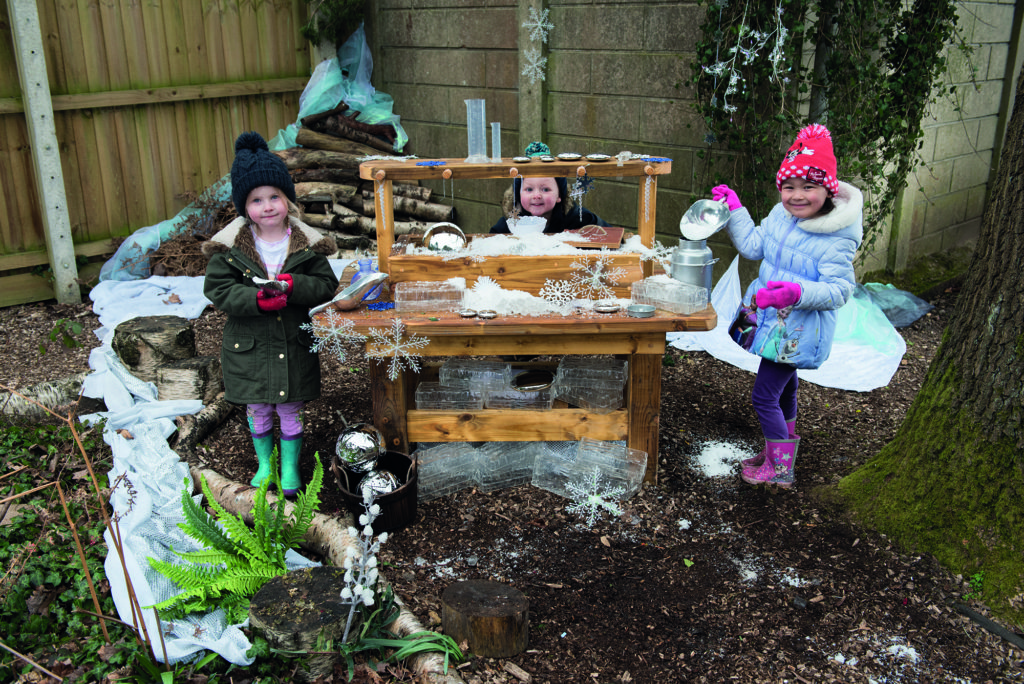 Messy play and mud kitchens with snow and ice outdoors
