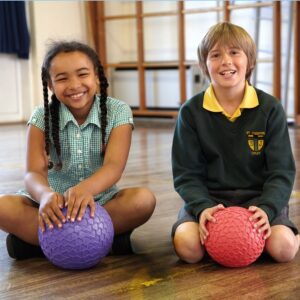 Children using easy grip balls