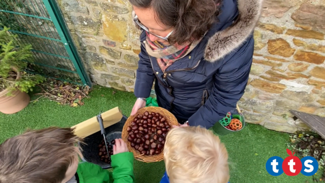 Children counting out conkers