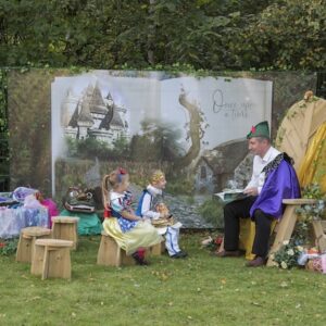 Immersive Environment Backdrop Once Upon a Time children having story time outside.