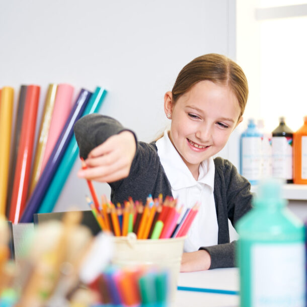 Girl using school stationery