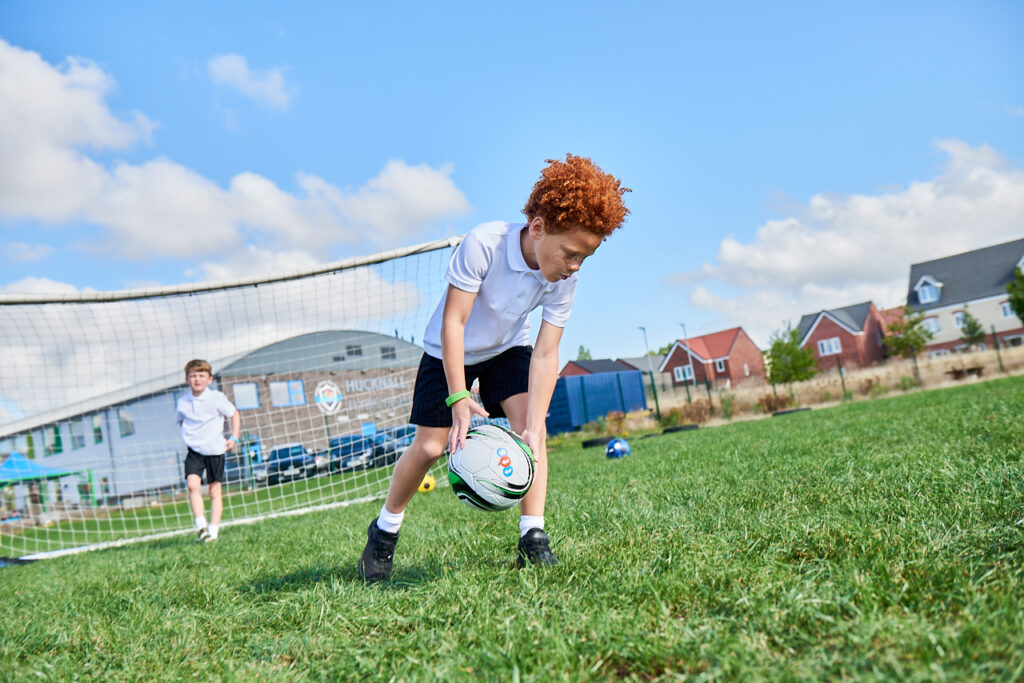 Boy with rugby ball